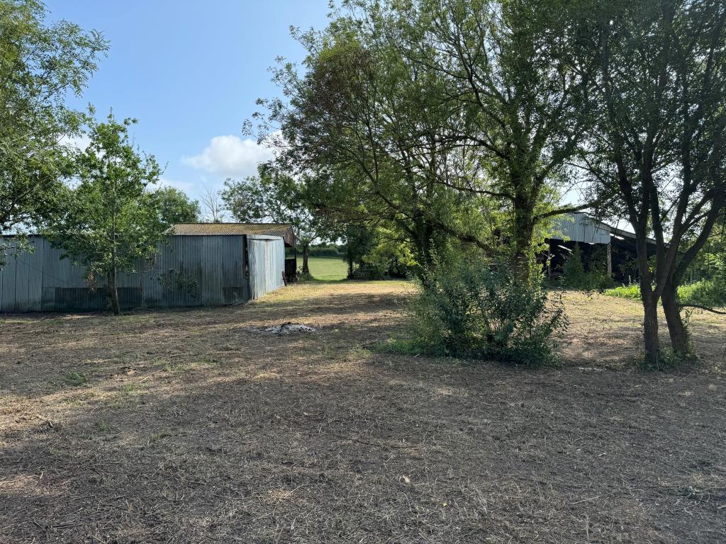 Lot: 130 - FREEHOLD RURAL BARN WITH CONSENT FOR CONVERSION ON A PLOT OF 1.27 ACRES - A View towards the Front of the Site